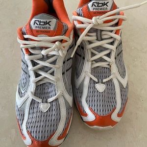 Reebok trainer, Size 9.5 women’s. Gently used, very clean and comfy. Orange.